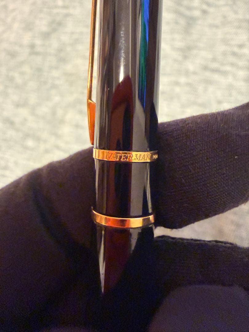 Black Waterman fountain pen with golden decorations and W logo on the cap