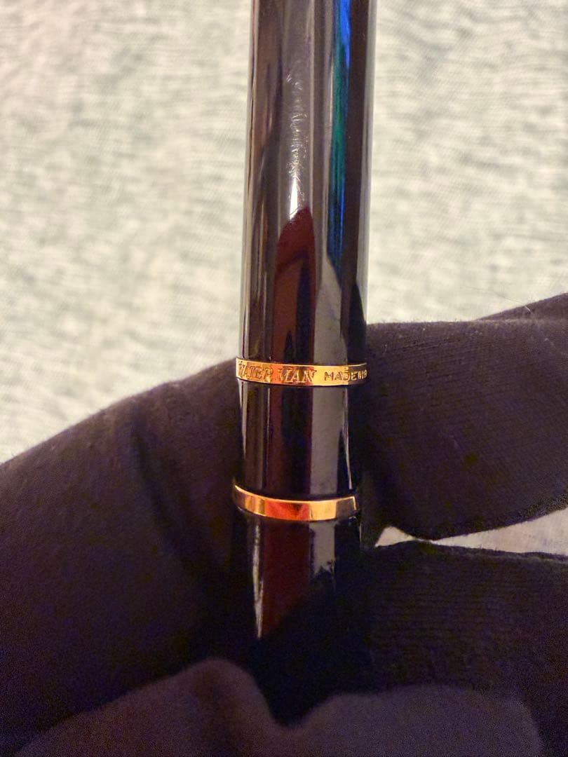 Black Waterman fountain pen with golden decorations and W logo on the cap