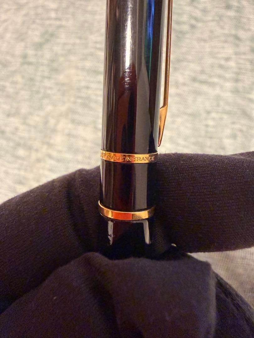 Black Waterman fountain pen with golden decorations and W logo on the cap
