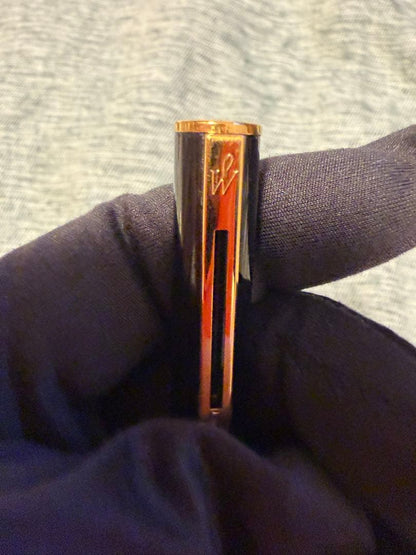 Black Waterman fountain pen with golden decorations and W logo on the cap