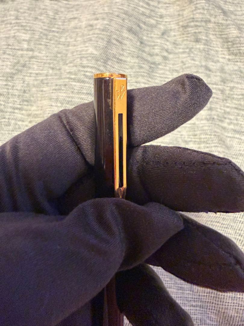 Black Waterman fountain pen with golden decorations and W logo on the cap