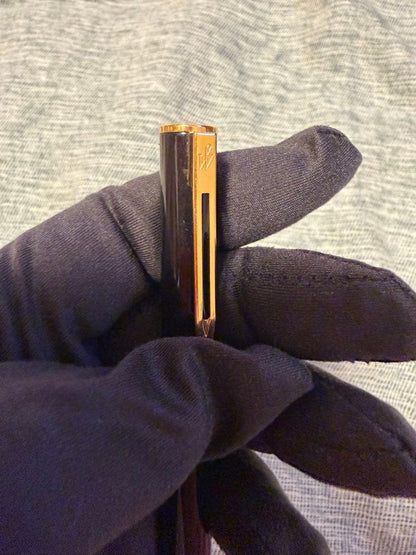 Black Waterman fountain pen with golden decorations and W logo on the cap