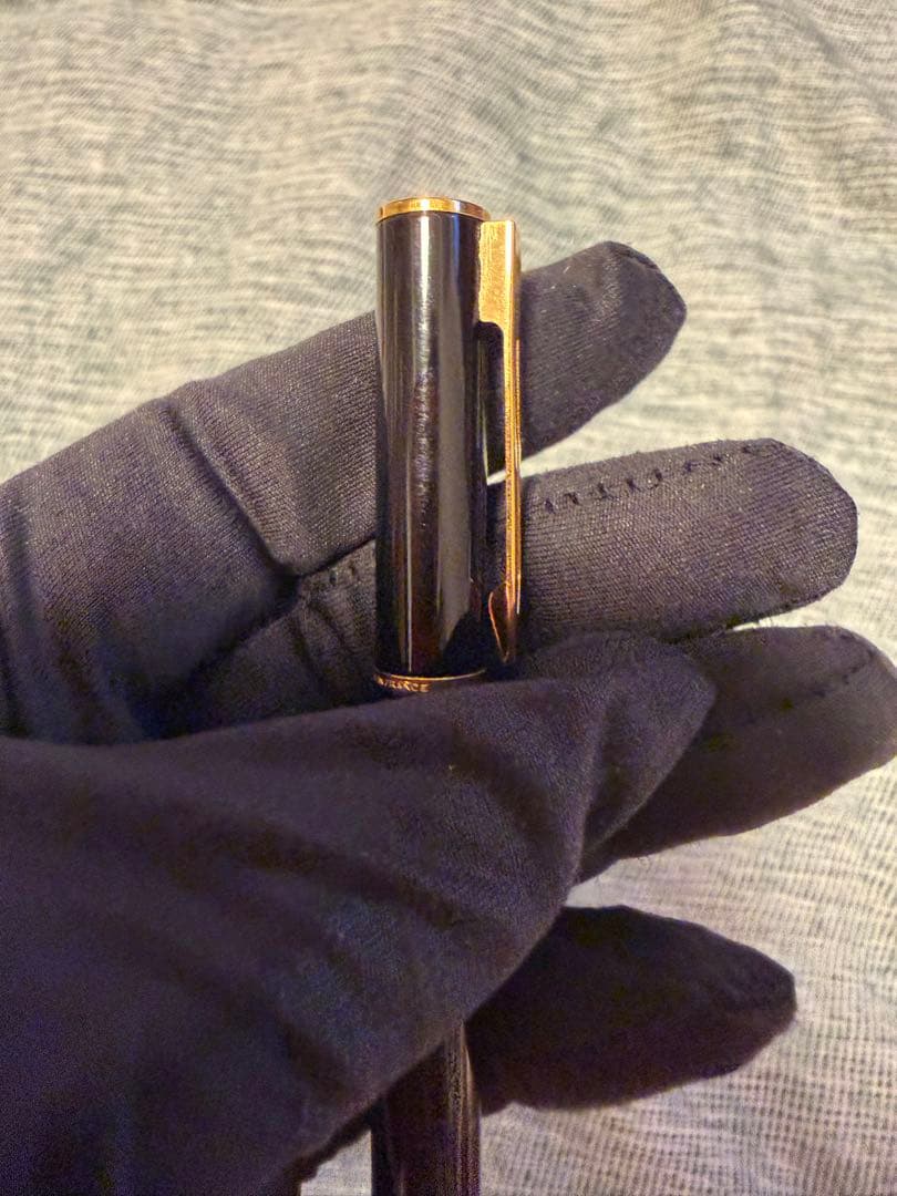 Black Waterman fountain pen with golden decorations and W logo on the cap
