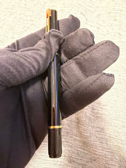 Black Waterman fountain pen with golden decorations and W logo on the cap