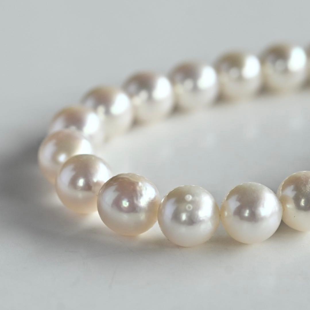 Highest grade Hanadama Tama Saki Akoya pearl necklace with lustrous white pearls on a fine strand