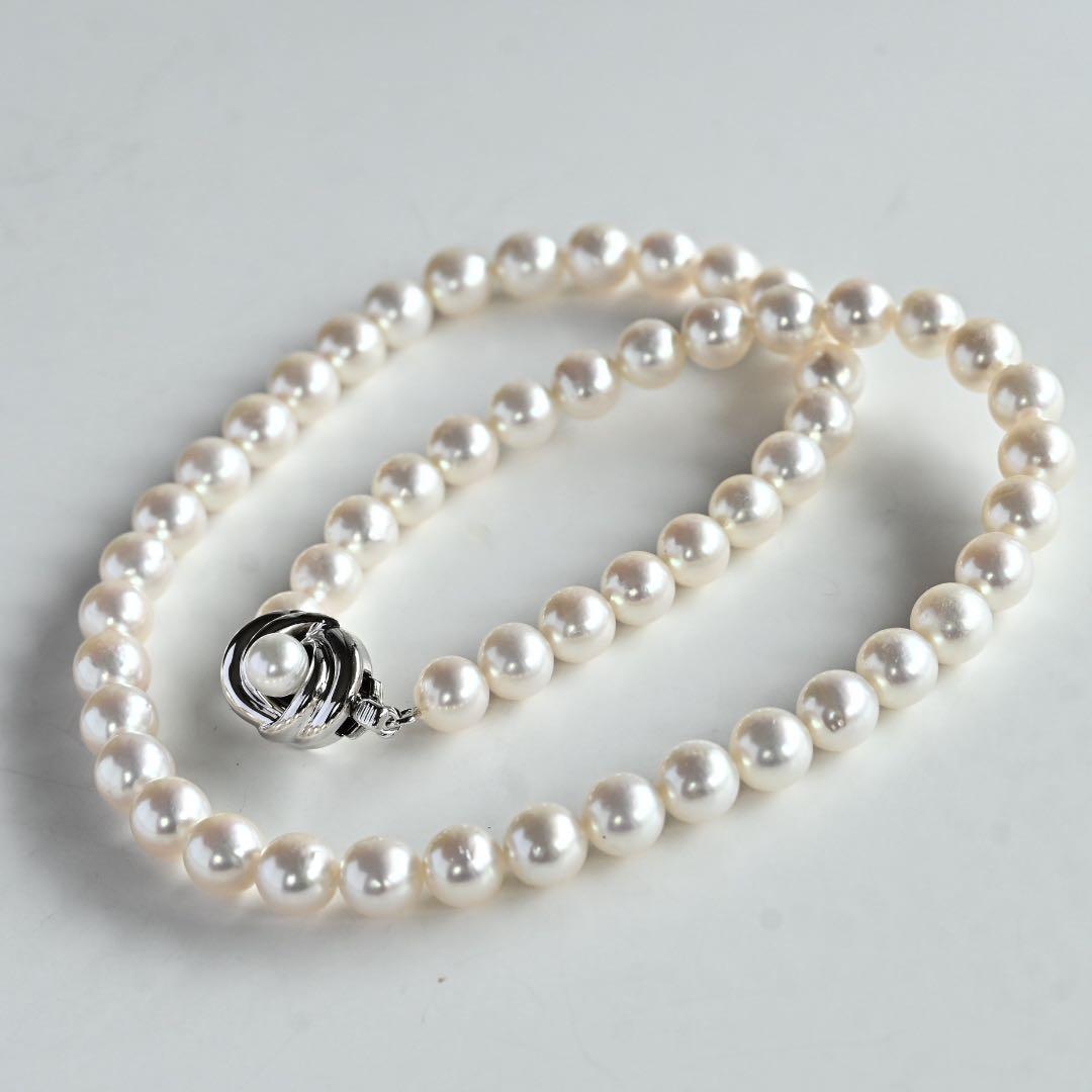 Highest grade Hanadama Tama Saki Akoya pearl necklace with lustrous white pearls on a fine strand