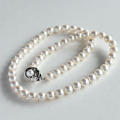 Highest grade Hanadama Tama Saki Akoya pearl necklace with lustrous white pearls on a fine strand
