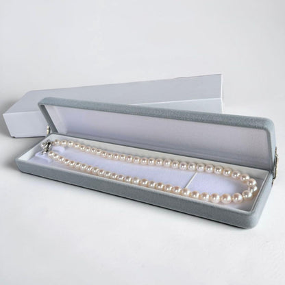 Highest grade Hanadama Tama Saki Akoya pearl necklace with lustrous white pearls on a fine strand