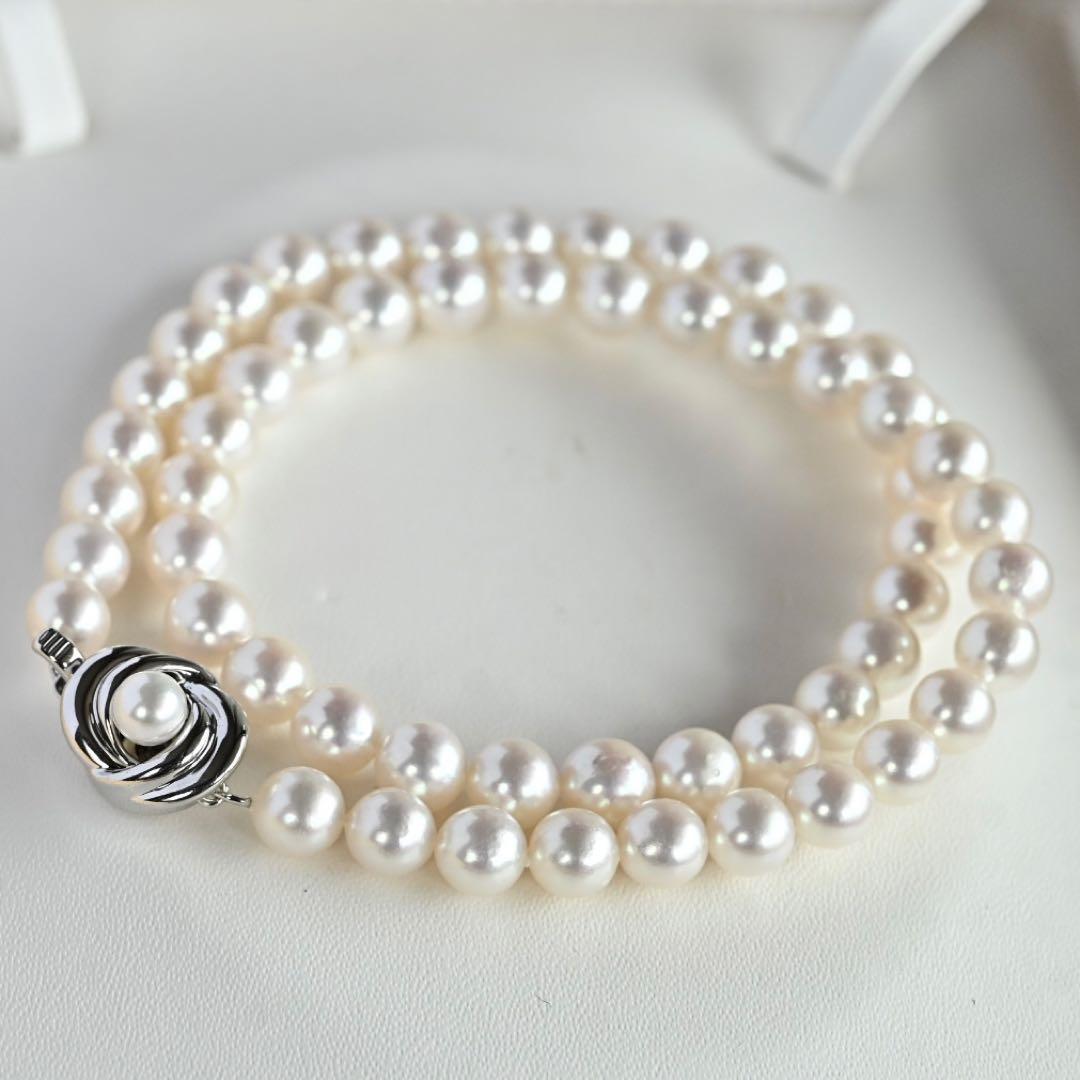 Highest grade Hanadama Tama Saki Akoya pearl necklace with lustrous white pearls on a fine strand