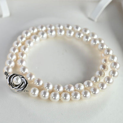 Highest grade Hanadama Tama Saki Akoya pearl necklace with lustrous white pearls on a fine strand