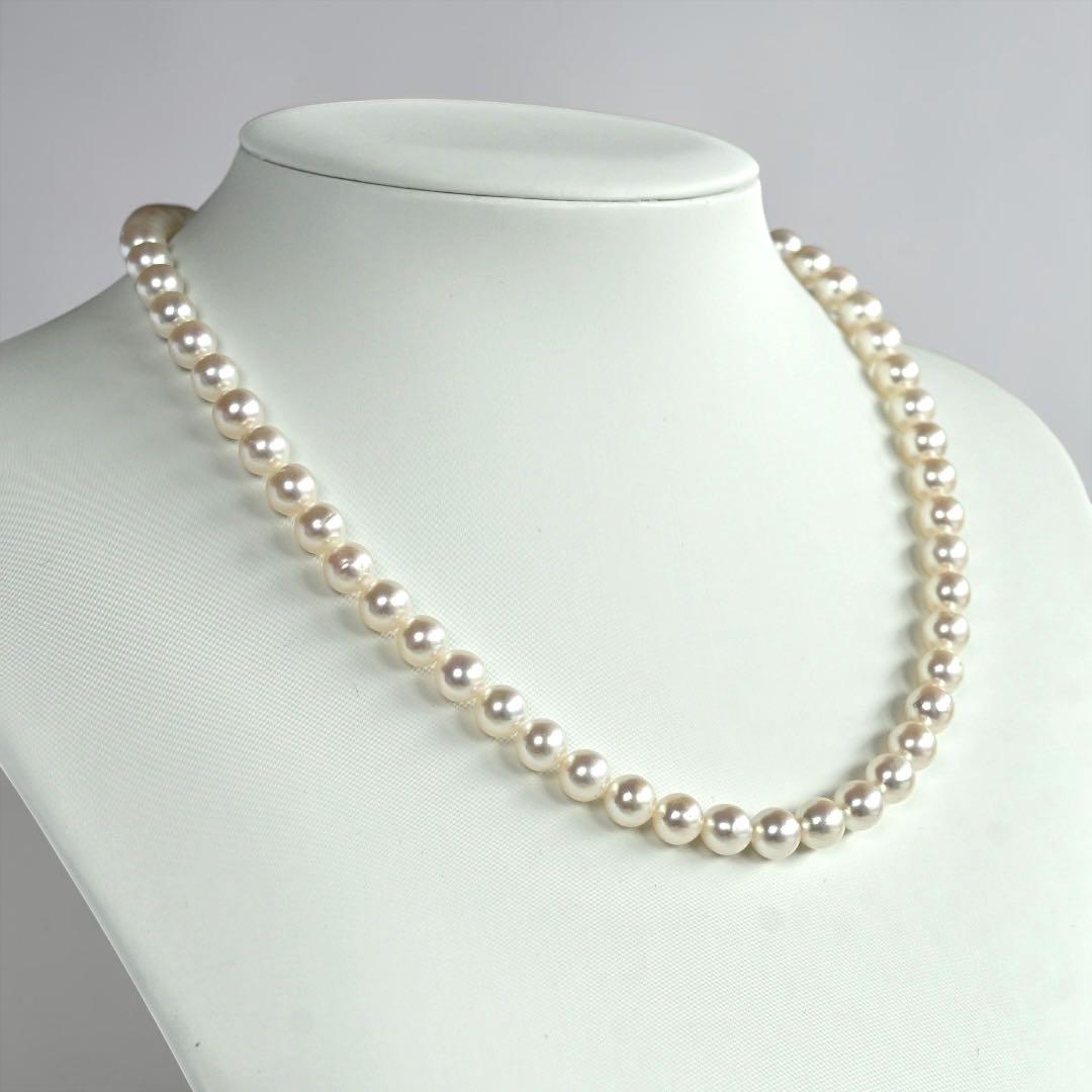 Highest grade Hanadama Tama Saki Akoya pearl necklace with lustrous white pearls on a fine strand