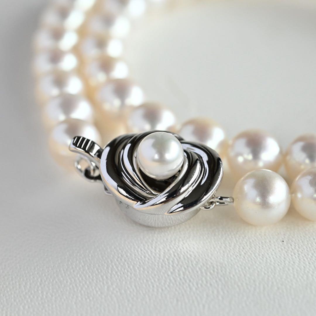 Highest grade Hanadama Tama Saki Akoya pearl necklace with lustrous white pearls on a fine strand