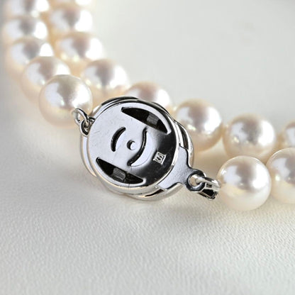 Highest grade Hanadama Tama Saki Akoya pearl necklace with lustrous white pearls on a fine strand