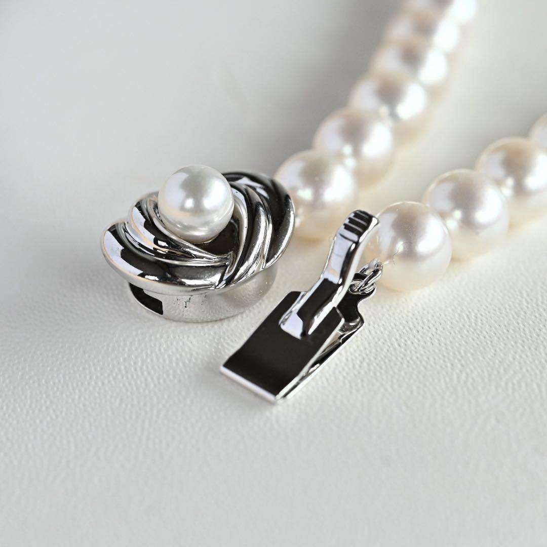 Highest grade Hanadama Tama Saki Akoya pearl necklace with lustrous white pearls on a fine strand