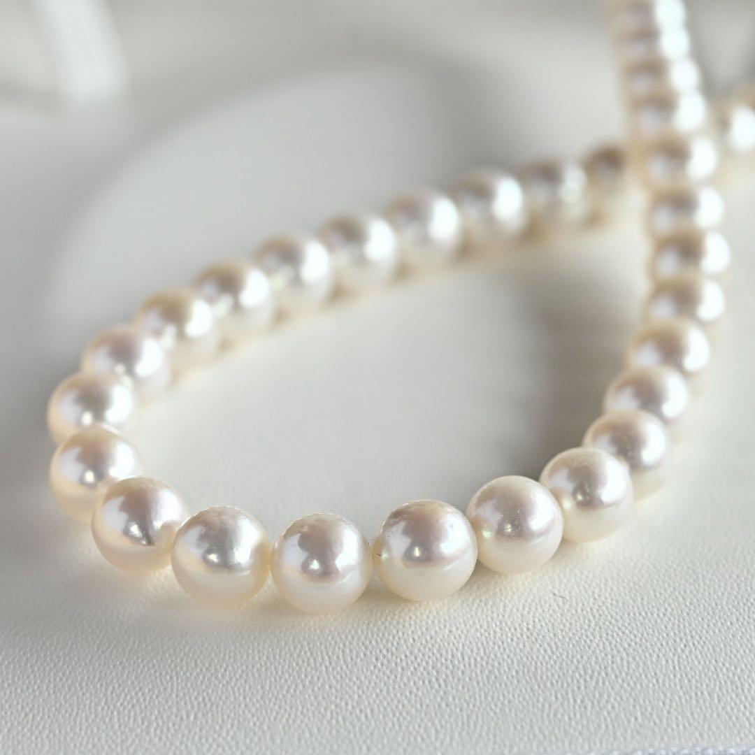 Highest grade Hanadama Tama Saki Akoya pearl necklace with lustrous white pearls on a fine strand