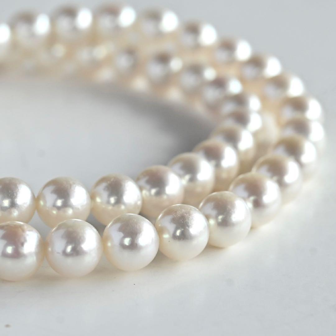 Highest grade Hanadama Tama Saki Akoya pearl necklace with lustrous white pearls on a fine strand