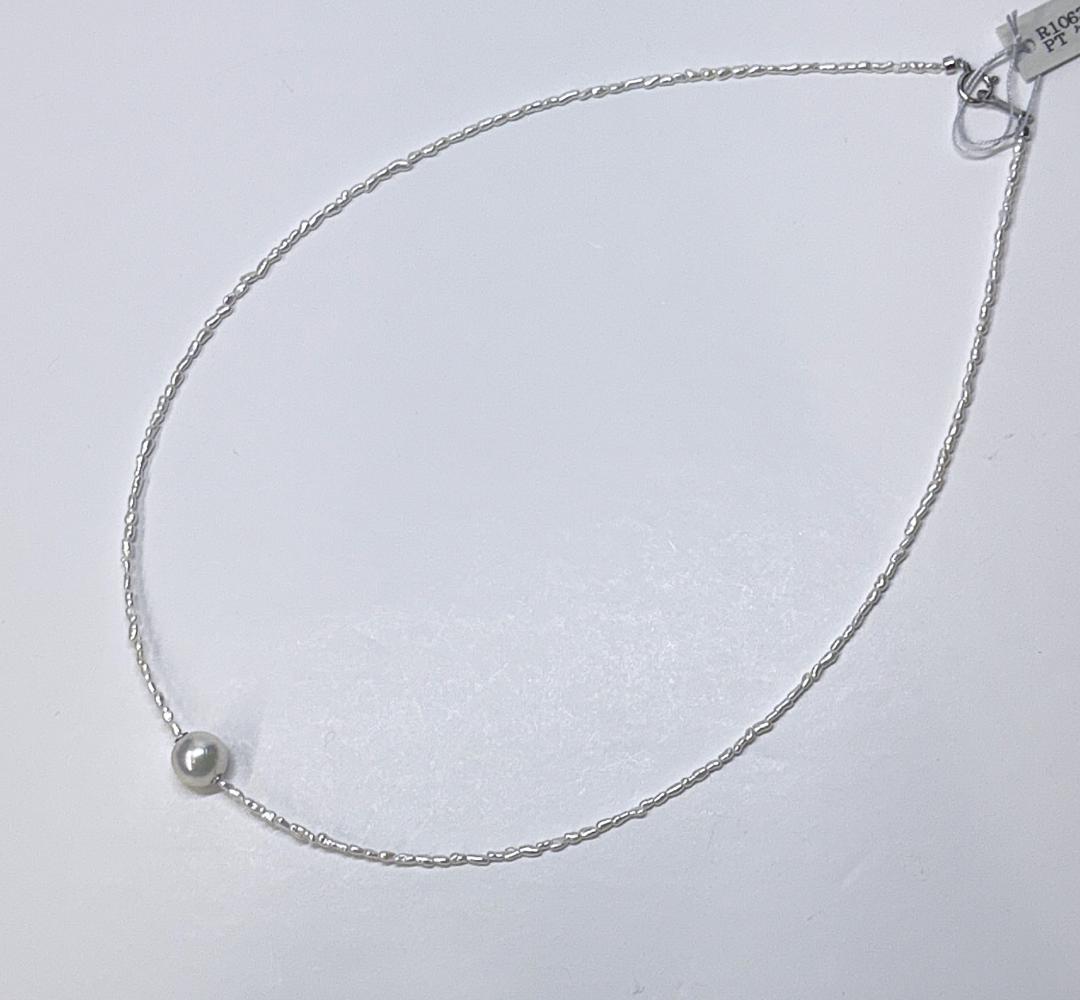Akoya Keshi Necklace featuring small baroque pearls and a greenish pink Akoya pearl on a 42cm wire finish chain with metal clasp