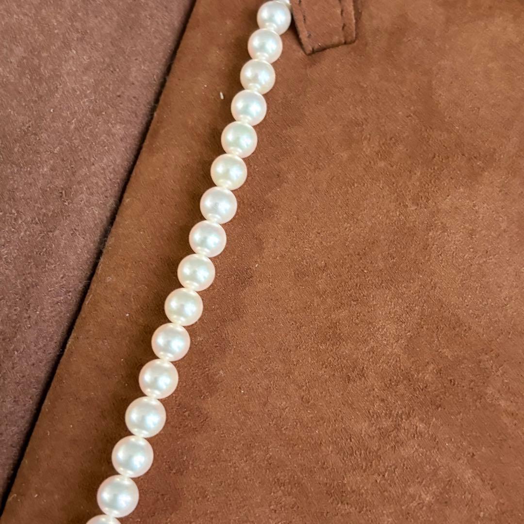 Mikimoto pearl necklace with 6.5-7.0mm pearls on 42 cm K18 gold chain with box and pouch