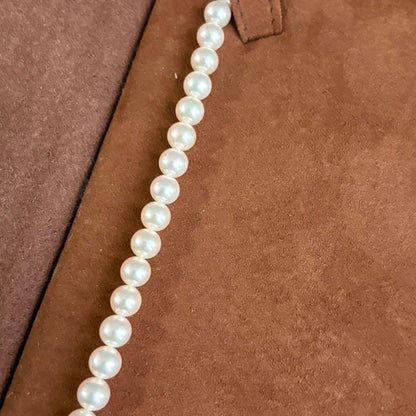 Mikimoto pearl necklace with 6.5-7.0mm pearls on 42 cm K18 gold chain with box and pouch