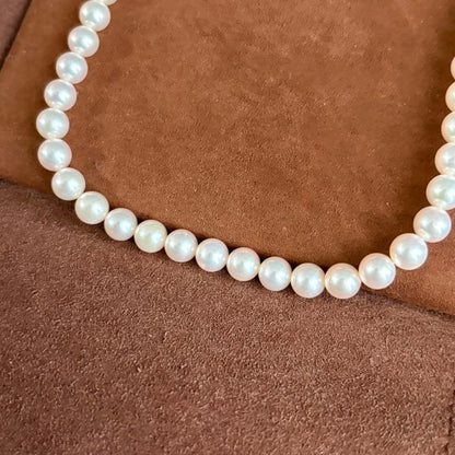 Mikimoto pearl necklace with 6.5-7.0mm pearls on 42 cm K18 gold chain with box and pouch
