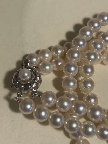 Akoya pearl necklace with two strands featuring 6.5 to 7 mm white pearls and 42.4 cm length