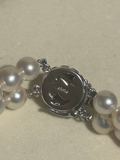 Akoya pearl necklace with two strands featuring 6.5 to 7 mm white pearls and 42.4 cm length