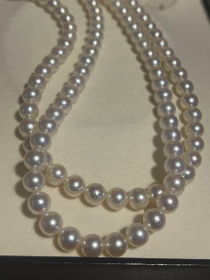 Akoya pearl necklace with two strands featuring 6.5 to 7 mm white pearls and 42.4 cm length
