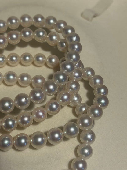 Akoya pearl necklace with two strands featuring 6.5 to 7 mm white pearls and 42.4 cm length