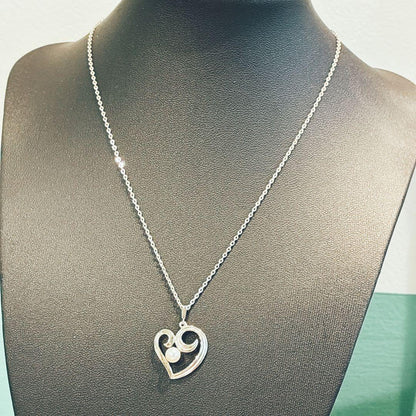 Mikimoto Heart Motif Necklace featuring silver heart pendant and 5mm pearl on a 40cm chain