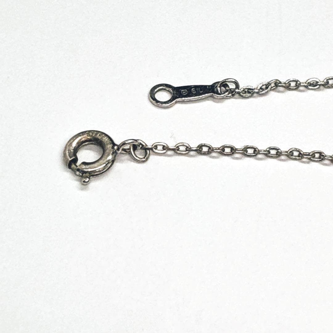 Mikimoto Heart Motif Necklace featuring silver heart pendant and 5mm pearl on a 40cm chain
