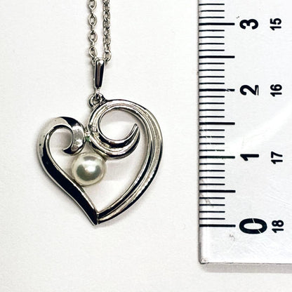 Mikimoto Heart Motif Necklace featuring silver heart pendant and 5mm pearl on a 40cm chain