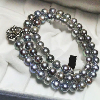Akoya genuine pearl necklace with 7.5mm blue gray pearls and silver markings