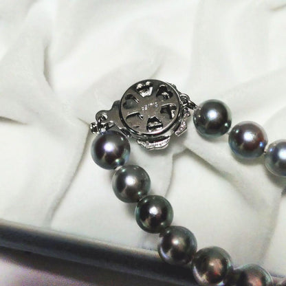Akoya genuine pearl necklace with 7.5mm blue gray pearls and silver markings