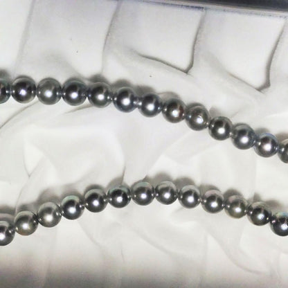 Akoya genuine pearl necklace with 7.5mm blue gray pearls and silver markings