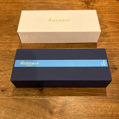 Waterman Metropolitan black metal ballpoint pen with its dedicated black case on a white background