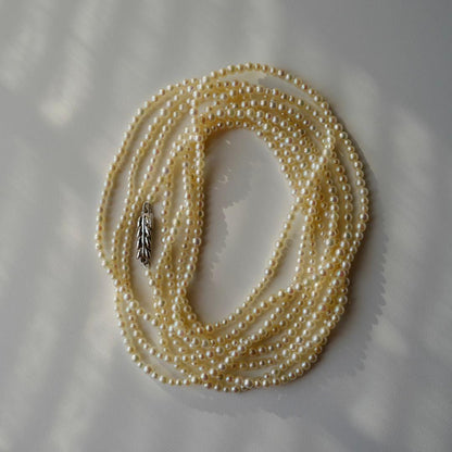 New Akoya pearl necklace with very small 2-3mm ivory pearls and silver clasp, 64.4 inches long