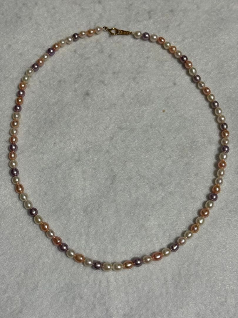 Tasaki K18 freshwater pearl necklace measuring 7.9 inches with elegant white pearls on gold chain