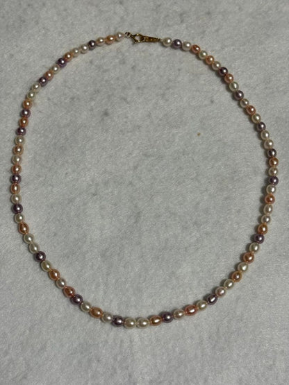 Tasaki K18 freshwater pearl necklace measuring 7.9 inches with elegant white pearls on gold chain