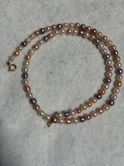 Tasaki K18 freshwater pearl necklace measuring 7.9 inches with elegant white pearls on gold chain