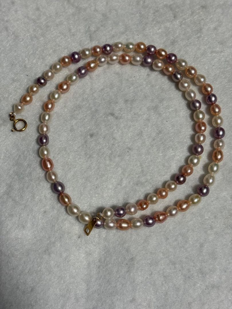 Tasaki K18 freshwater pearl necklace measuring 7.9 inches with elegant white pearls on gold chain