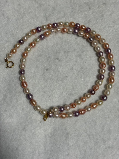 Tasaki K18 freshwater pearl necklace measuring 7.9 inches with elegant white pearls on gold chain