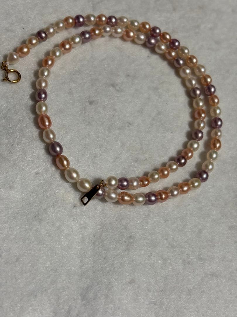 Tasaki K18 freshwater pearl necklace measuring 7.9 inches with elegant white pearls on gold chain