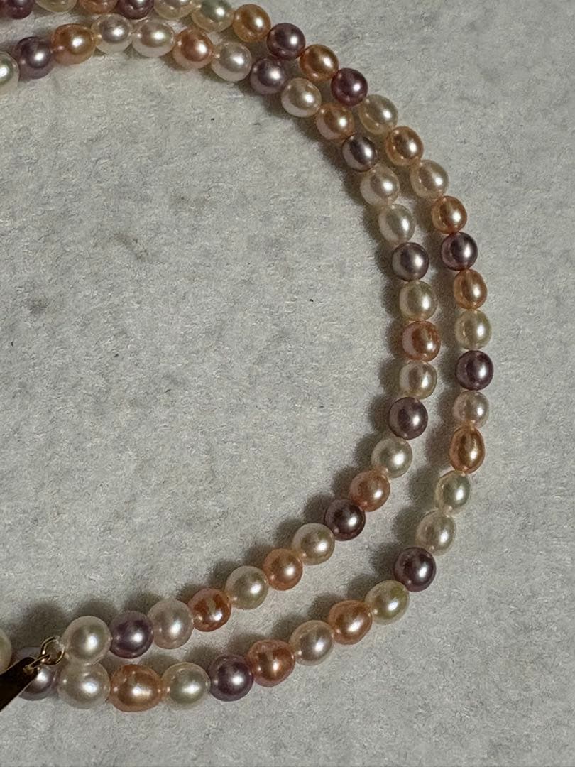 Tasaki K18 freshwater pearl necklace measuring 7.9 inches with elegant white pearls on gold chain