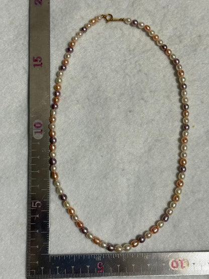 Tasaki K18 freshwater pearl necklace measuring 7.9 inches with elegant white pearls on gold chain