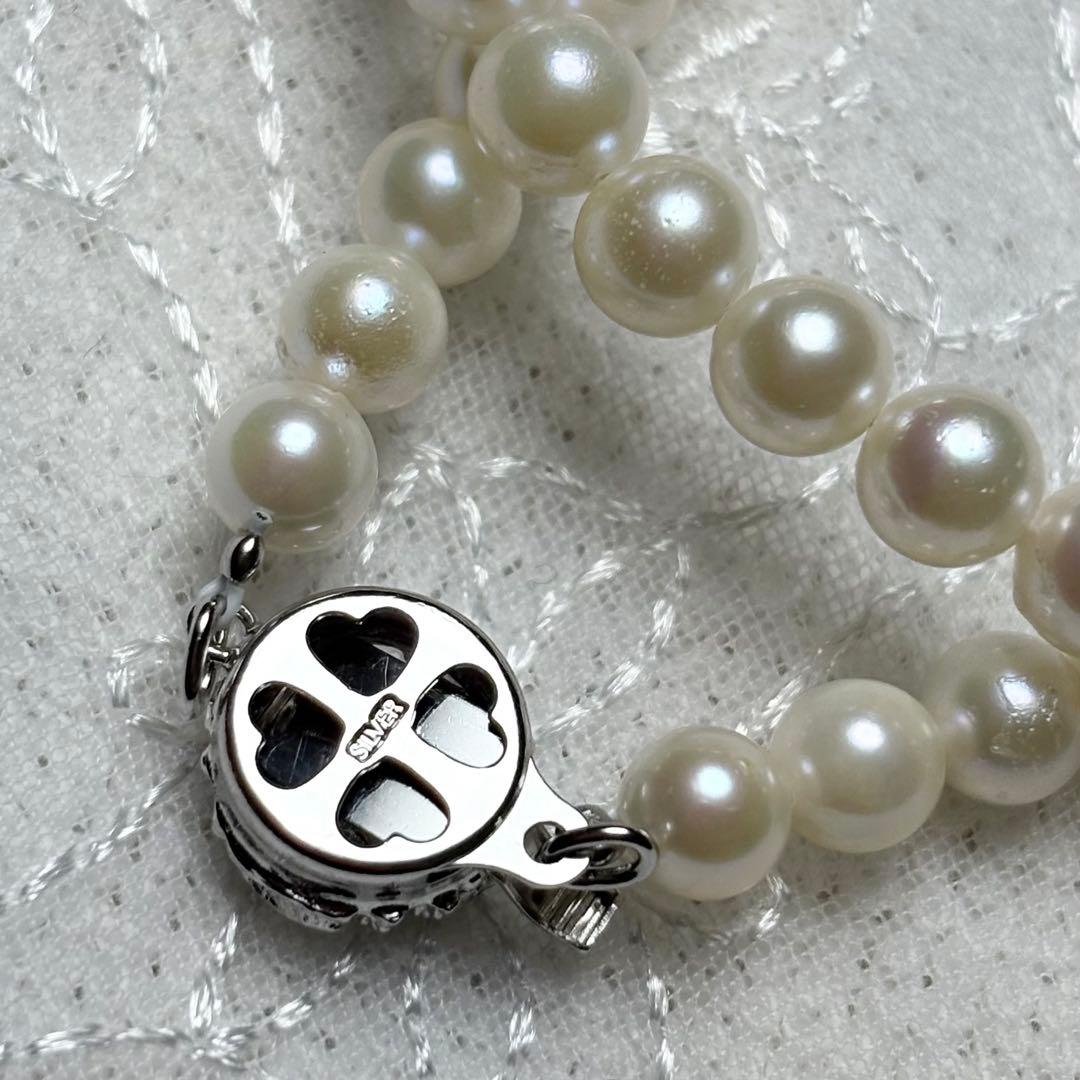 Law Akoya pearl necklace featuring natural white pearls 5.5-6.0 mm diameter with silver clasp on 42 cm chain