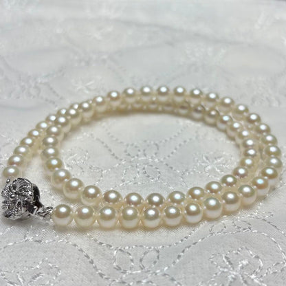 Law Akoya pearl necklace featuring natural white pearls 5.5-6.0 mm diameter with silver clasp on 42 cm chain