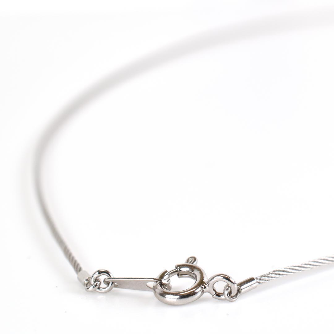 Tasaki necklace with one 9.3mm black pearl and six diamonds on white gold platinum chain