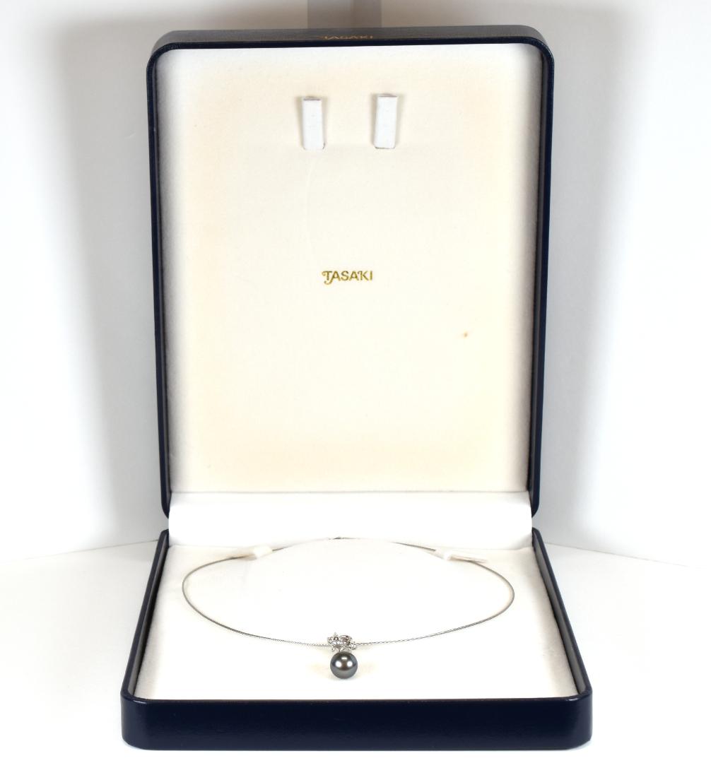 Tasaki necklace with one 9.3mm black pearl and six diamonds on white gold platinum chain