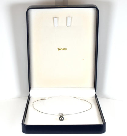 Tasaki necklace with one 9.3mm black pearl and six diamonds on white gold platinum chain
