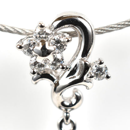 Tasaki necklace with one 9.3mm black pearl and six diamonds on white gold platinum chain